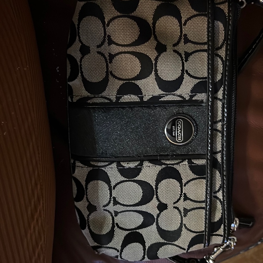 Well loved vintage Coach small wristlet